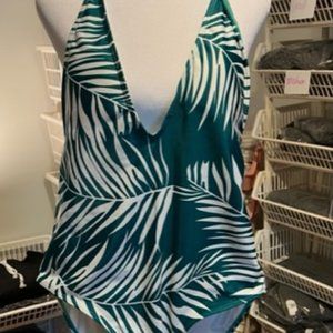 One piece swim suit V neck open back tie at neck green and white fern pattern.